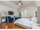 Spacious bedroom with hardwood floors, a large window, and comfortable seating area offering a relaxing retreat at 18534 Carnegie Overlook Blvd # 110, Davidson, NC 28036