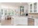Beautiful kitchen featuring marble countertops, stainless steel appliances, and a view into the dining area at 18534 Carnegie Overlook Blvd # 110, Davidson, NC 28036
