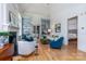 Bright living room with vaulted ceilings, built-in bookshelves, and access to the sunroom, perfect for relaxation and entertaining at 18534 Carnegie Overlook Blvd # 110, Davidson, NC 28036