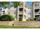 Exterior of the building shows a private terrace at 18730 Nautical Dr # 102, Cornelius, NC 28031