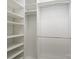 Spacious walk-in closet with custom shelving and ample storage space at 18730 Nautical Dr # 102, Cornelius, NC 28031