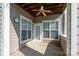 Covered patio with ceiling fan is perfect for outdoor living and entertaining at 18730 Nautical Dr # 102, Cornelius, NC 28031