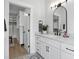 This spacious bathroom has double sinks, an expansive vanity, and a walk-in closet at 19 Berea Baptist Church Rd, Stanfield, NC 28163