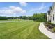 Sidewalk and professionally landscaped yard leading to the home at 19 Berea Baptist Church Rd, Stanfield, NC 28163