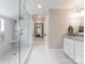 Modern bathroom with a glass walk-in shower and marble throughout at 2015 Lombardy Cir, Charlotte, NC 28203
