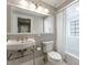 Bathroom features a pedestal sink, toilet, and shower/tub combination at 2015 Lombardy Cir, Charlotte, NC 28203