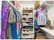 Well-organized walk-in closet with clothes and shelving at 2015 Lombardy Cir, Charlotte, NC 28203