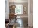 Dining room with a wooden table, chairs, bench seating, and decorative light fixture at 2015 Lombardy Cir, Charlotte, NC 28203