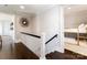 Bright hallway features dark wood floors and stairs to a bunk room at 2015 Lombardy Cir, Charlotte, NC 28203