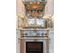 Stainless steel range with stainless steel backsplash and marble countertop at 2015 Lombardy Cir, Charlotte, NC 28203