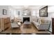 Elegant living room featuring a fireplace, stylish furnishings, and ample natural light at 2015 Lombardy Cir, Charlotte, NC 28203