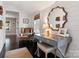 Sitting room or office features a desk, mirror and comfortable chair at 2015 Lombardy Cir, Charlotte, NC 28203
