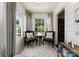 Charming sunroom featuring comfortable seating, a stylish rug, and plenty of natural light at 2015 Lombardy Cir, Charlotte, NC 28203