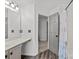 Clean bathroom with a large mirror, modern vanity, and shower-tub combo at 2137 Whispering Way, Charlotte, NC 28212