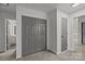Hallway featuring a closet, with a view of the bathroom and bedroom at 2137 Whispering Way, Charlotte, NC 28212