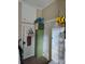 Small hallway with a view of an storage area at 215 9Th St, Spencer, NC 28159