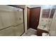 Bathroom features a standing shower, vanity with sink, and a toilet at 233 Hicks Rd, Statesville, NC 28625