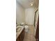 Bathroom featuring a vanity with a sink, toilet, and standing shower at 233 Hicks Rd, Statesville, NC 28625