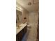 Bathroom features a bathtub, toilet, and vanity with a beige sink at 233 Hicks Rd, Statesville, NC 28625