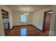 Bright dining room with hardwood floors and chandelier at 233 Hicks Rd, Statesville, NC 28625