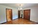 Dining room showcasing hardwood floors and two entryways at 233 Hicks Rd, Statesville, NC 28625