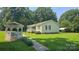 Lovely home with a charming gazebo, lush green lawn, and a convenient carport at 233 Hicks Rd, Statesville, NC 28625