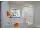 Luxurious bathroom featuring a soaking tub, glass-enclosed shower, and stylish tile accents at 2407 Baxter Se Pl, Concord, NC 28025