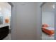 Hallway view features a bathroom and bedroom with modern decor at 2407 Baxter Se Pl, Concord, NC 28025