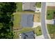 An aerial view of a home with a gray roof and a well-maintained lawn and manicured landscaping at 252 Broadleaf Dr, Denver, NC 28037