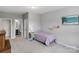 Cozy bedroom with a twin bed, soft carpet, and ensuite bathroom access for added convenience at 252 Broadleaf Dr, Denver, NC 28037