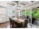 Elegant dining room with coffered ceilings and access to the outdoor deck at 252 Broadleaf Dr, Denver, NC 28037