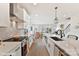 Modern open-concept kitchen with stainless steel appliances and light cabinets at 3006 Khan Park Dr # 69, Charlotte, NC 28206