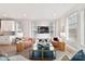 Bright living room featuring large windows, plush furniture, and modern decor at 3006 Khan Park Dr # 69, Charlotte, NC 28206