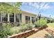 Picturesque backyard view featuring flowers and patio at 3079 Azalea Dr, Fort Mill, SC 29707
