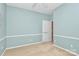 Cozy bedroom with light-blue walls, chair rail, and ceiling fan for added comfort at 3079 Azalea Dr, Fort Mill, SC 29707