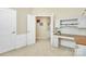 Bedroom featuring a built-in desk area, open door and trim at 3079 Azalea Dr, Fort Mill, SC 29707