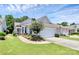 Charming single-story home with a well-manicured lawn and a two-car garage, displaying a neat exterior at 3079 Azalea Dr, Fort Mill, SC 29707