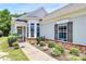 Inviting front entrance with stone accents, manicured landscaping, and a charming front porch, creating an appealing welcome at 3079 Azalea Dr, Fort Mill, SC 29707