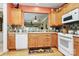 Well-equipped kitchen with wood cabinets, modern appliances, and a convenient layout, making meal preparation enjoyable at 3079 Azalea Dr, Fort Mill, SC 29707