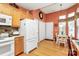 Spacious kitchen with modern appliances, wood cabinets, and a cozy dining nook, providing ample space for cooking and dining at 3079 Azalea Dr, Fort Mill, SC 29707