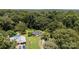 Spacious property featuring a charming home, inviting pool, and convenient carport, all nestled within a lush, verdant landscape at 3419 Boat Club Rd, Belmont, NC 28012
