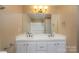 Large bathroom with a dual sink vanity, and shower over tub at 402 Scotland Dr, Kings Mountain, NC 28086
