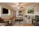 Staged living room with hardwood floors, large windows, and stylish decor at 402 Scotland Dr, Kings Mountain, NC 28086