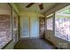 Cozy screened porch with brick accents and access to the backyard at 402 Scotland Dr, Kings Mountain, NC 28086