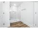 Bathroom showcasing a glass-enclosed shower with marble-style tiling and modern fixtures at 411 Patience Dr, Concord, NC 28025
