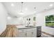 Kitchen with granite countertops, stainless steel appliances, and open access to the living spaces at 411 Patience Dr, Concord, NC 28025
