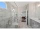 Spa-like bathroom with large glass shower, double vanity, and connection to main bedroom at 507 Yucatan Dr # 71, Waxhaw, NC 28173