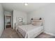 Bedroom view showcasing a dresser and bed, offering a warm and inviting space at 507 Yucatan Dr # 71, Waxhaw, NC 28173