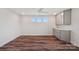 Bonus room featuring wood floors, abundant natural light, and built-in cabinets and counter space at 507 Yucatan Dr # 71, Waxhaw, NC 28173