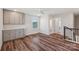 Upstairs bonus room featuring wood floors, natural light, built-in cabinetry, and access to a full bathroom at 507 Yucatan Dr # 71, Waxhaw, NC 28173
